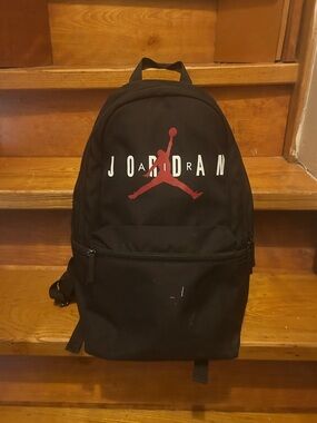 Jordan Black Backpack with Red Jumpman and White Logo used once for school trip